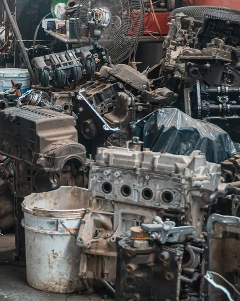 Vehicle engines and automotive components in a workshop